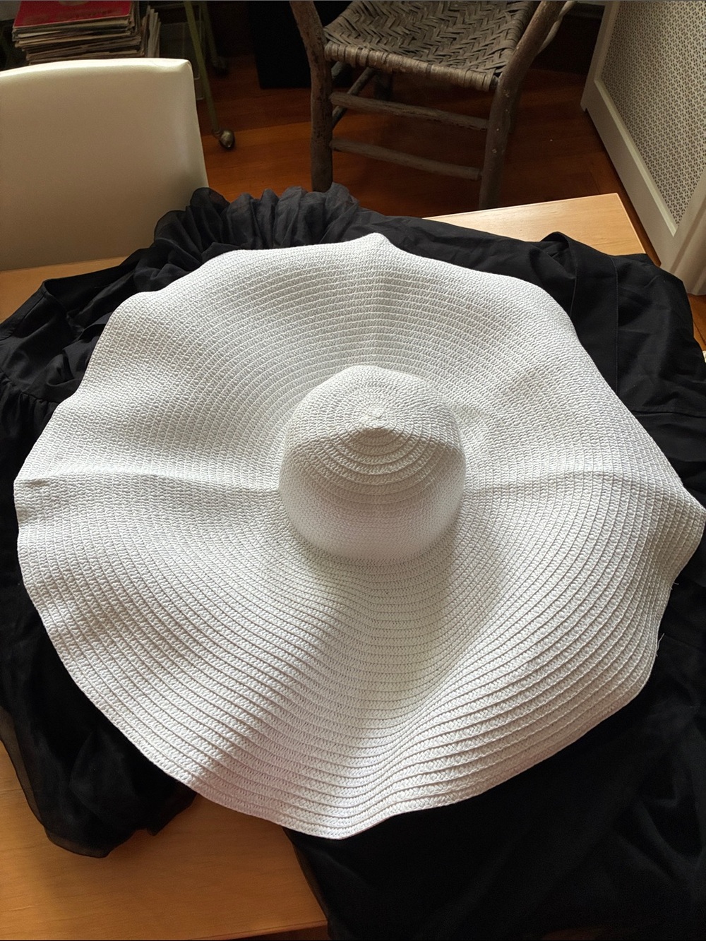 Very large white sun hat